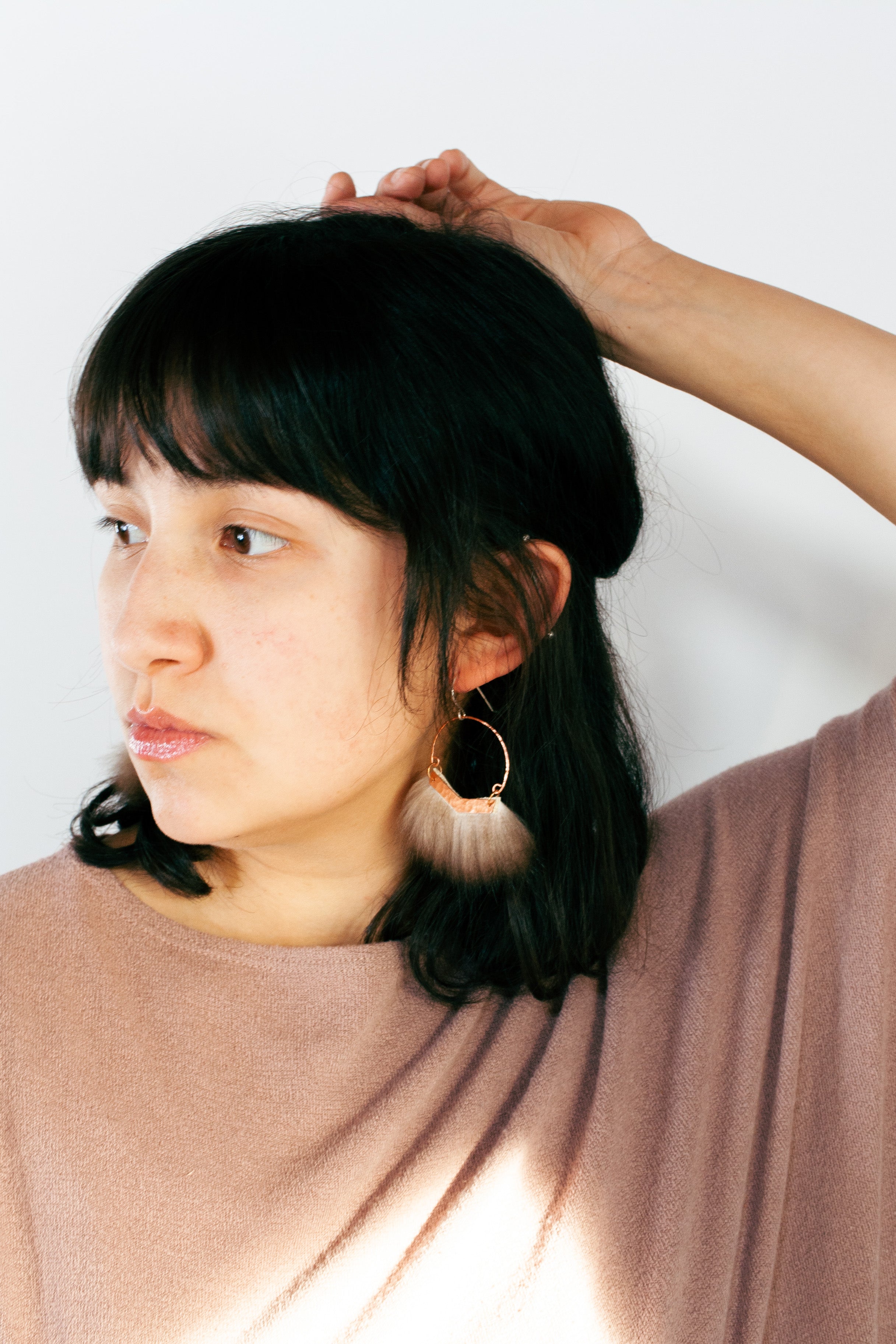 Sea otter fur and hammered copper earring