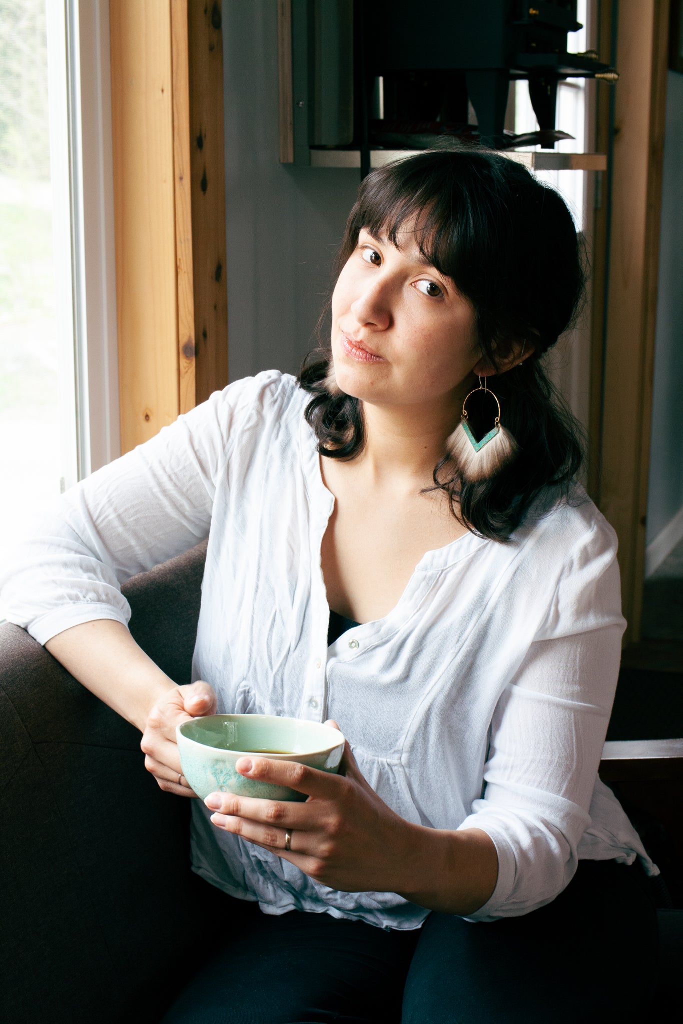 Comfy Saturday morning coffee with statement earrings
