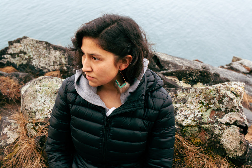 wintery photoshoot with ocean views and contemporary jewelry