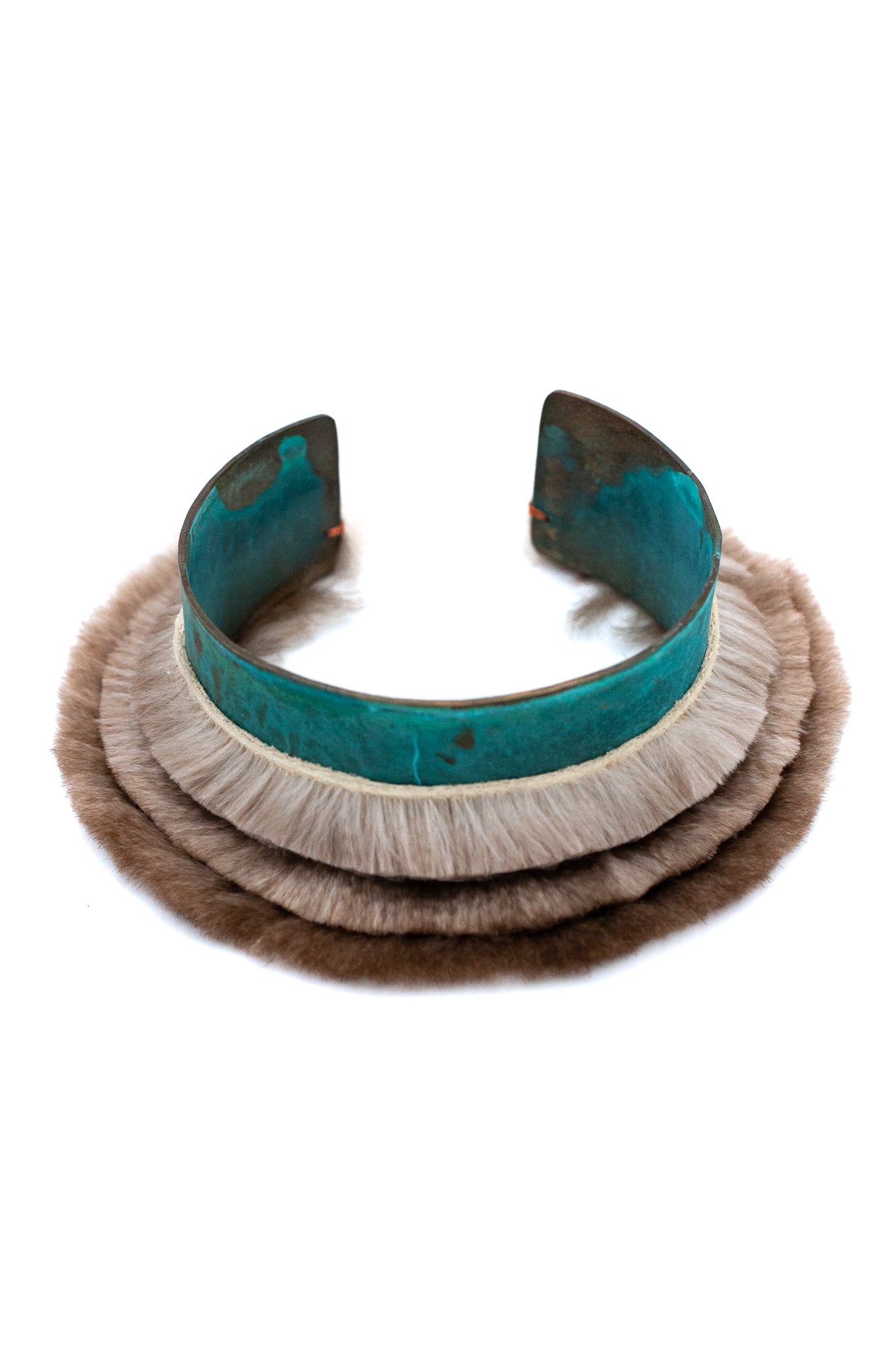The tiered Bracelet with blue patina and sea otter fur