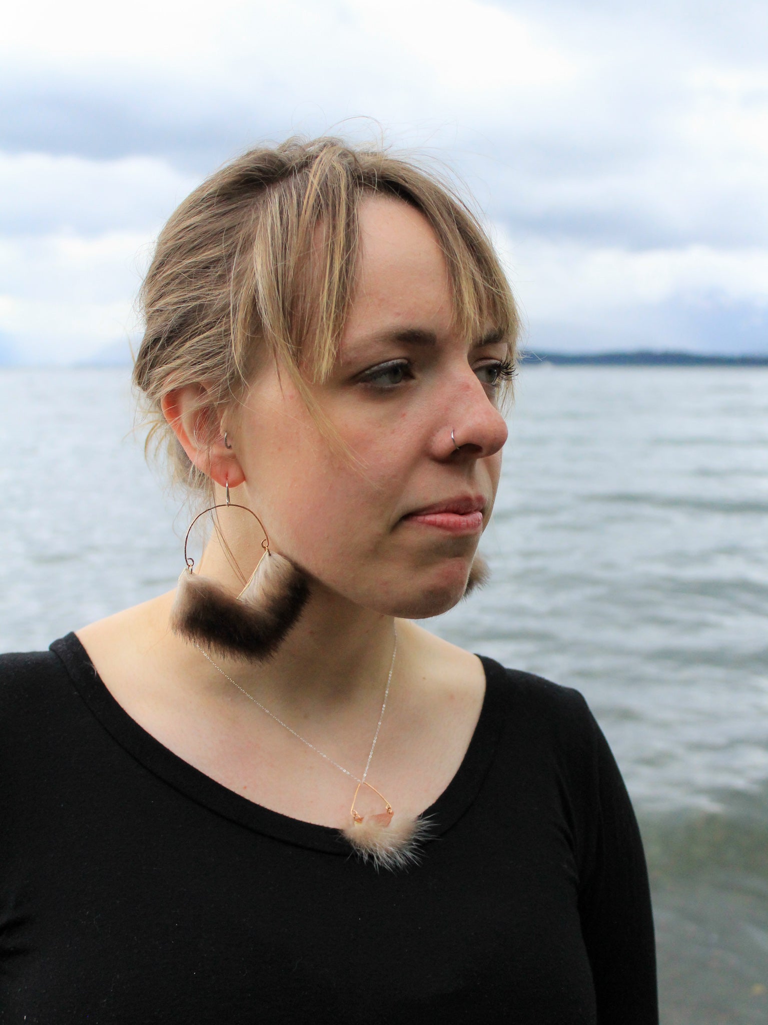 sea otter fur earrings inspired by the ocean in which they came.