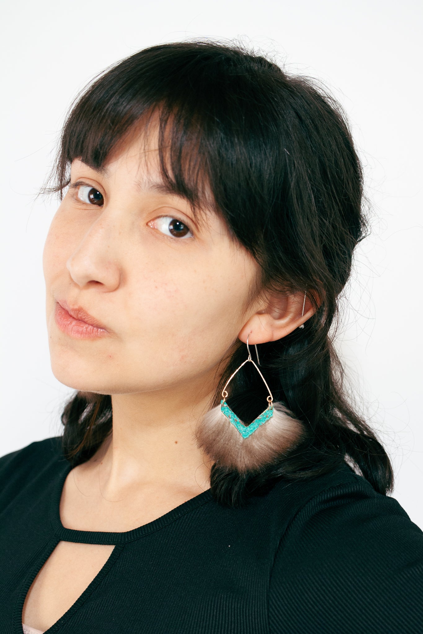 modern statement earrings with bright blue